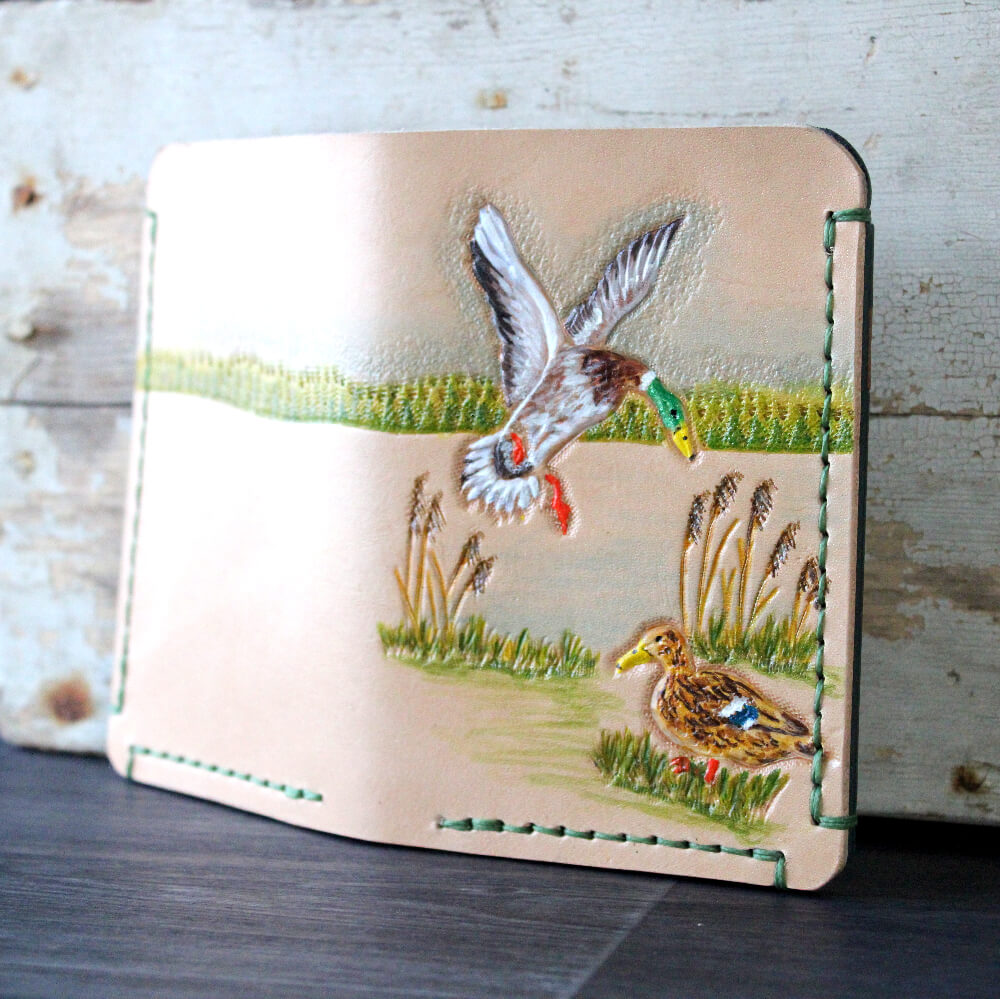 nahkalompakko-sinisorsat-kasinkuvioitu-varjatty